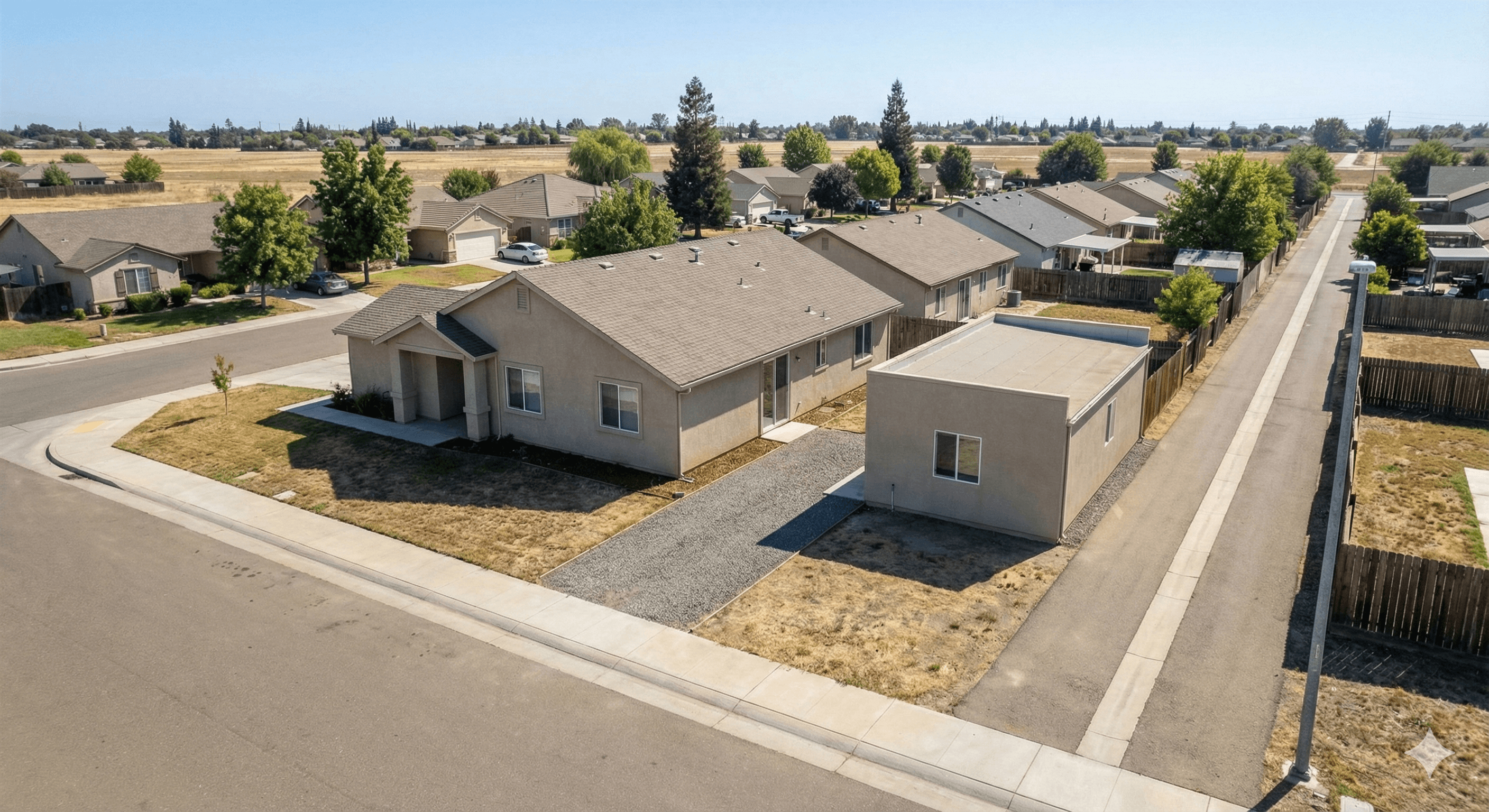 Sacramento backyard ADU design example showing detached ADU and main house