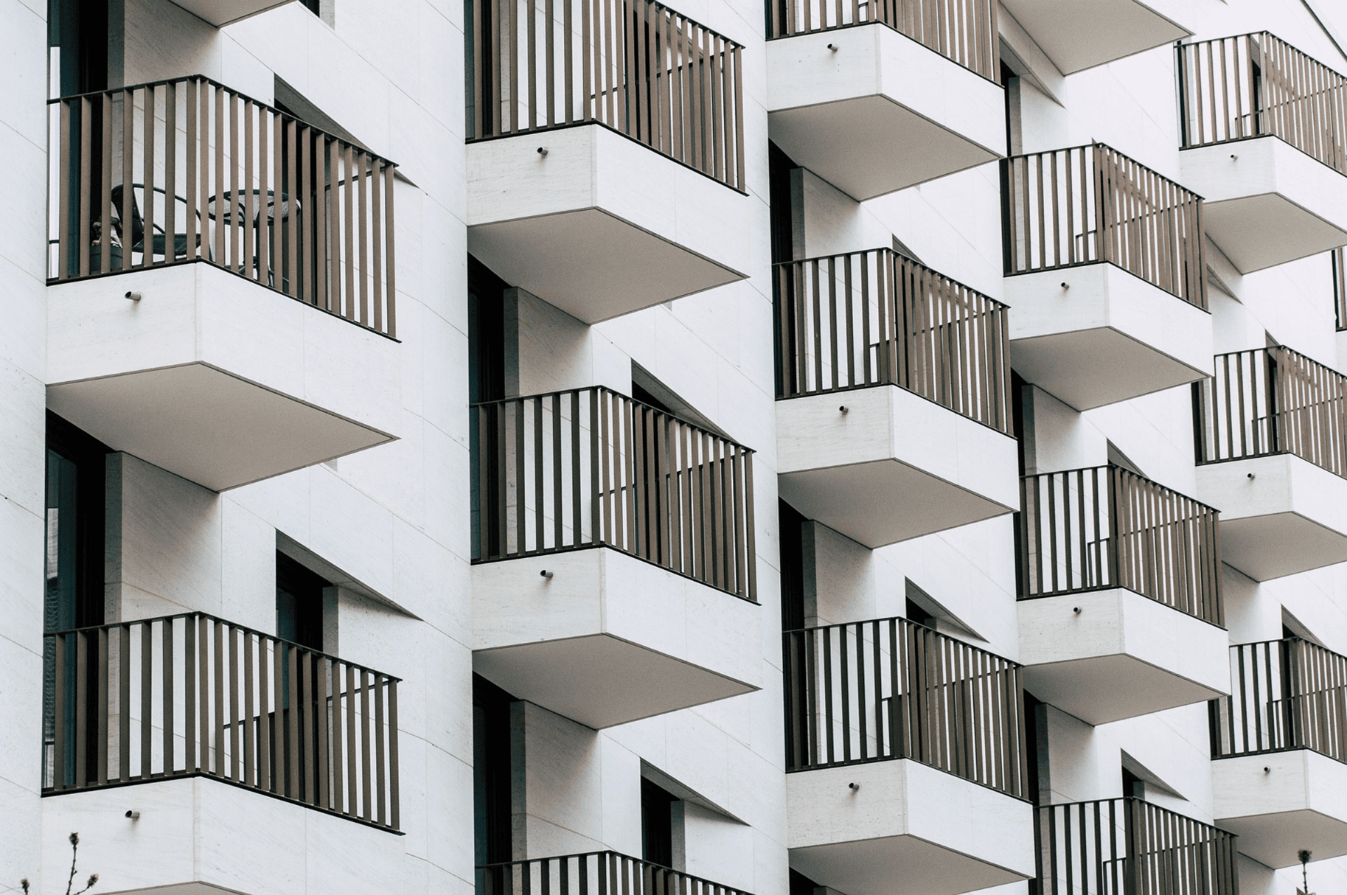 Diagram of SB 721 covered buildings and exterior elevated elements: balconies, decks, stairways, walkways, and railings on rental buildings with three or more units