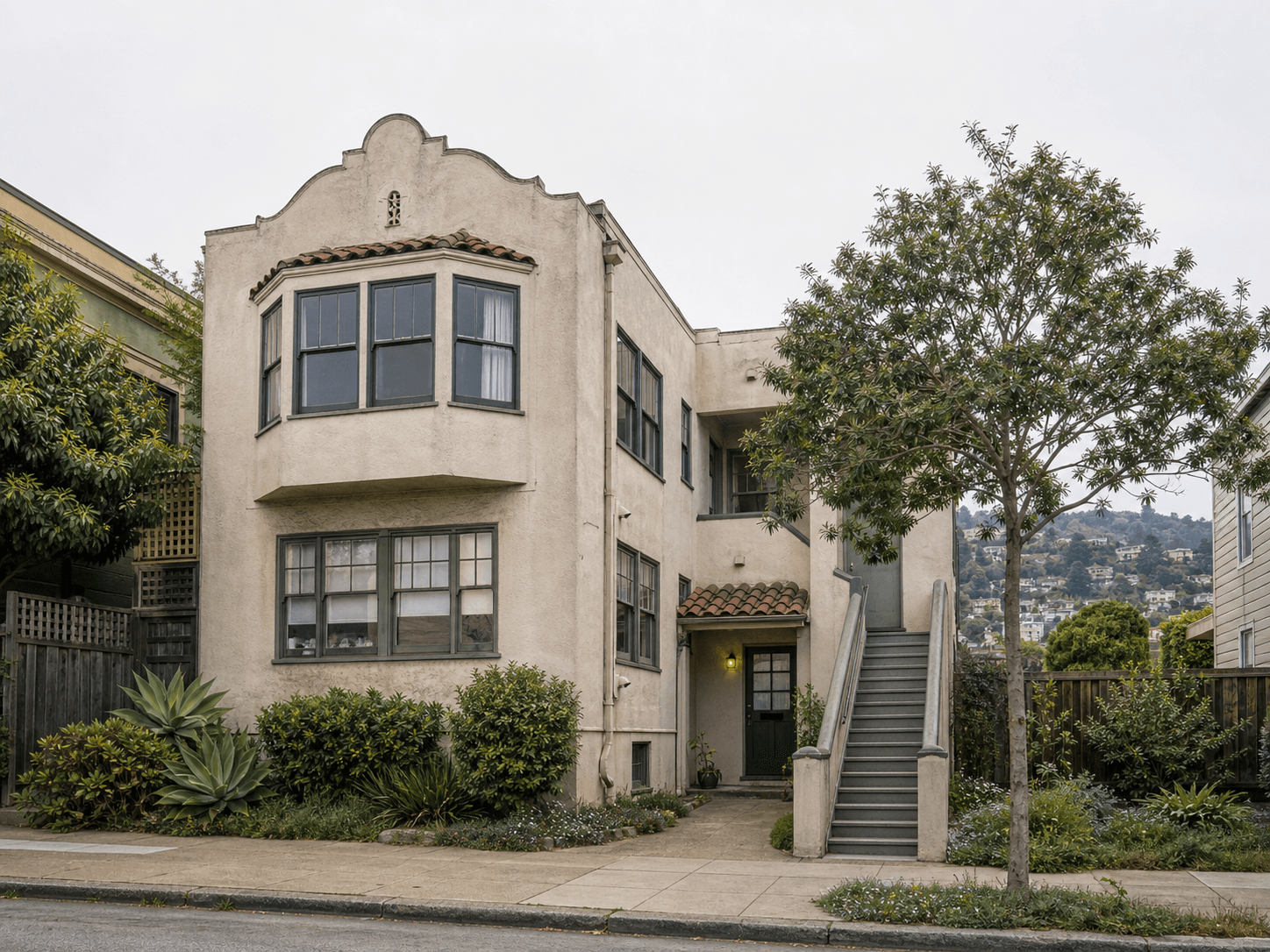 Conceptual older Oakland multifamily building with a separate ground-level ADU entrance