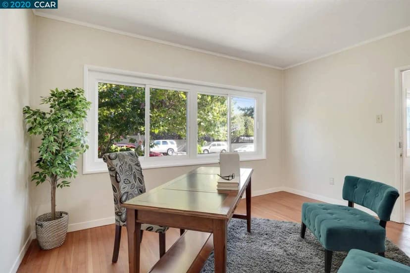 Existing dining room showing site constraints before ADU construction