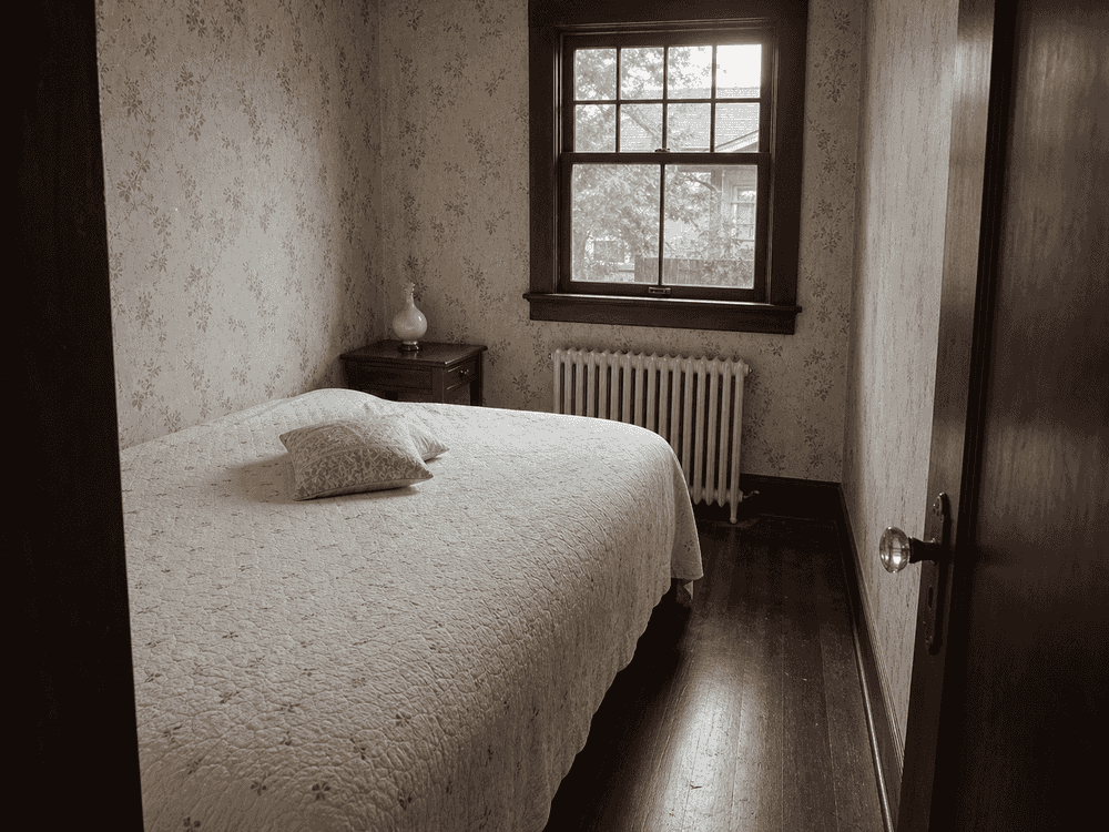 Small guest bedroom that could not accommodate the grandparents before the addition