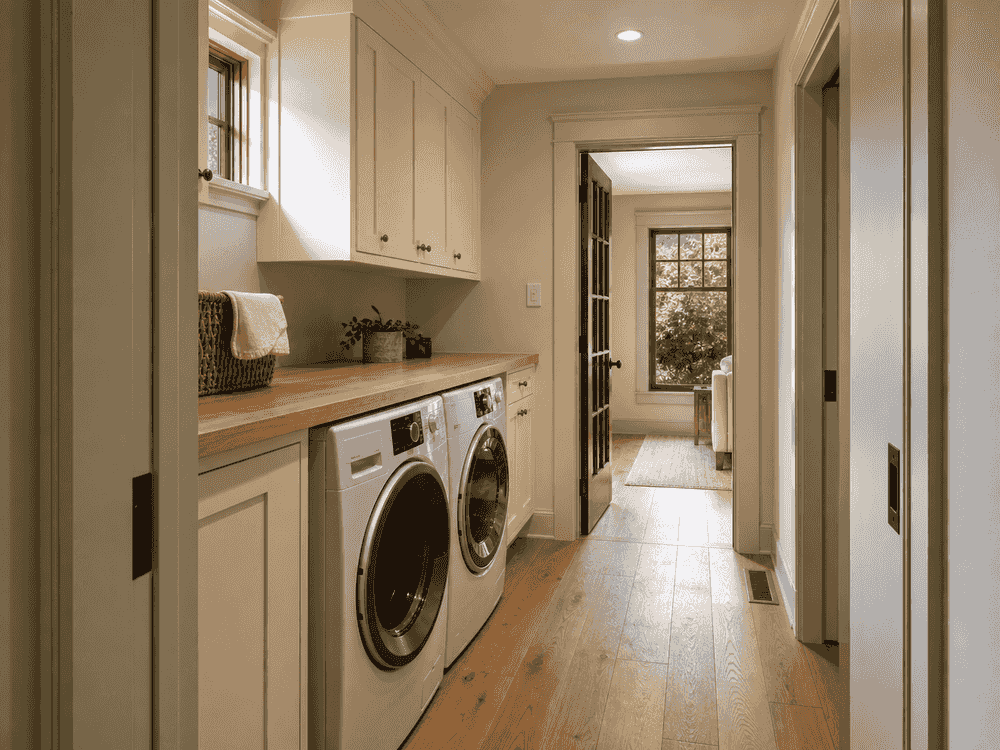 Shared laundry hall connecting the new wing to the main house