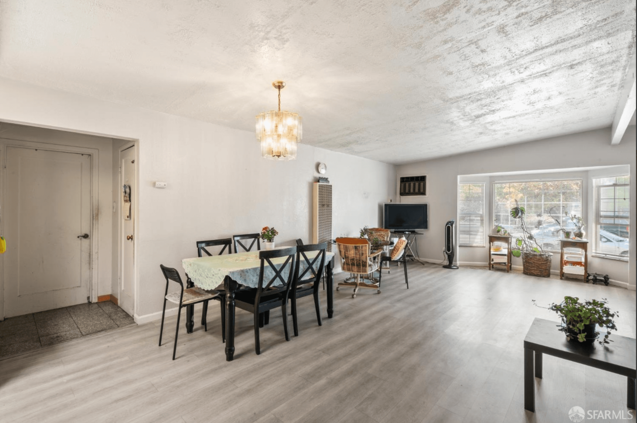 Interior dining area showing narrow side yard limiting expansion options