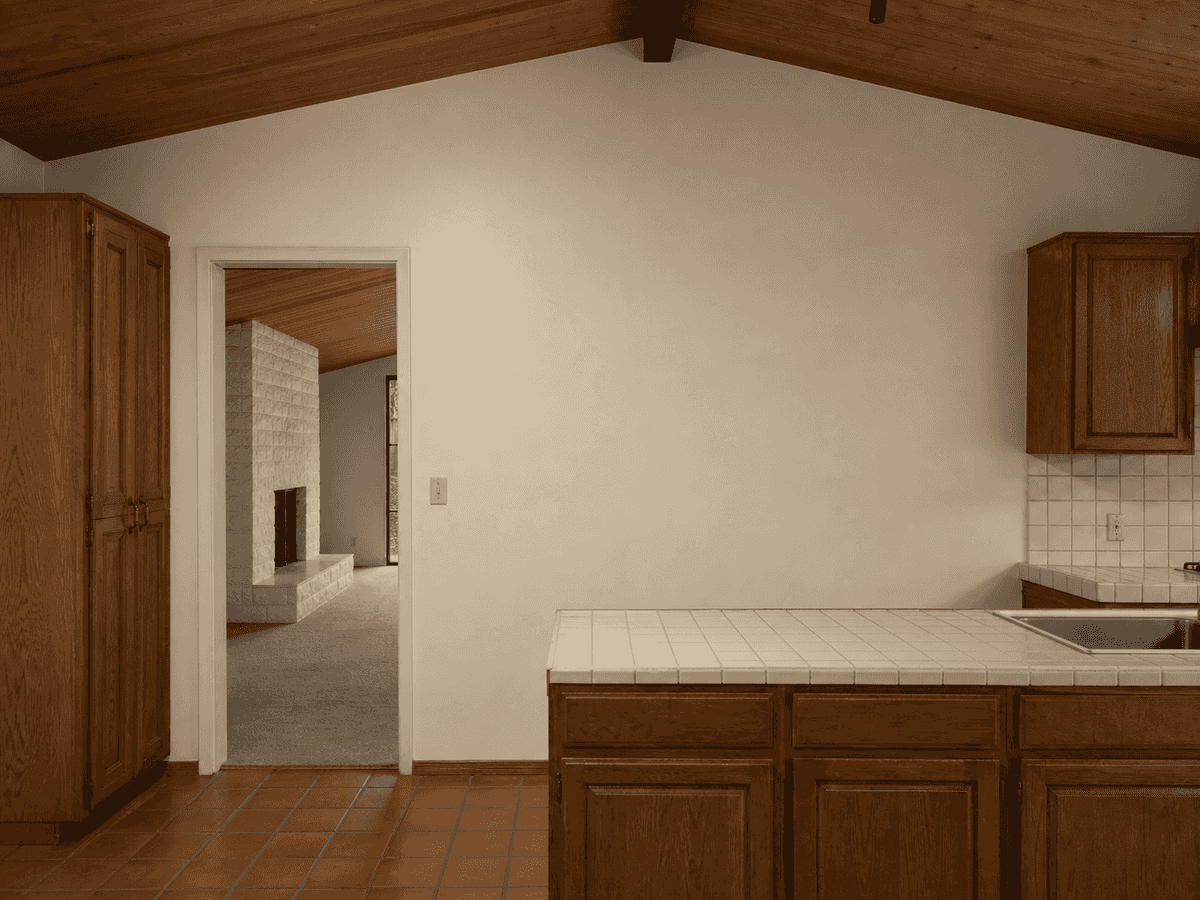 Closed Walnut Creek kitchen wall before moment-frame installation