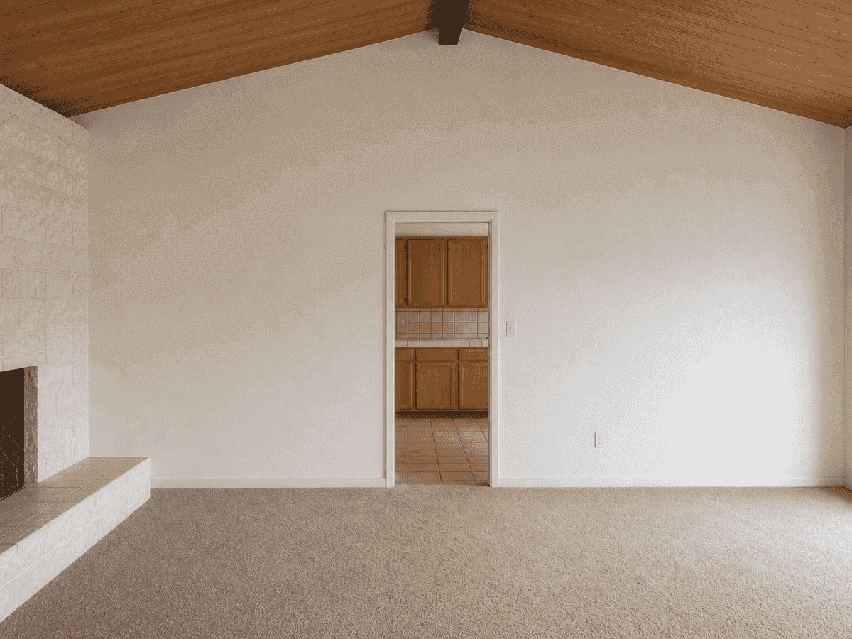 Vaulted family room separated from the original kitchen